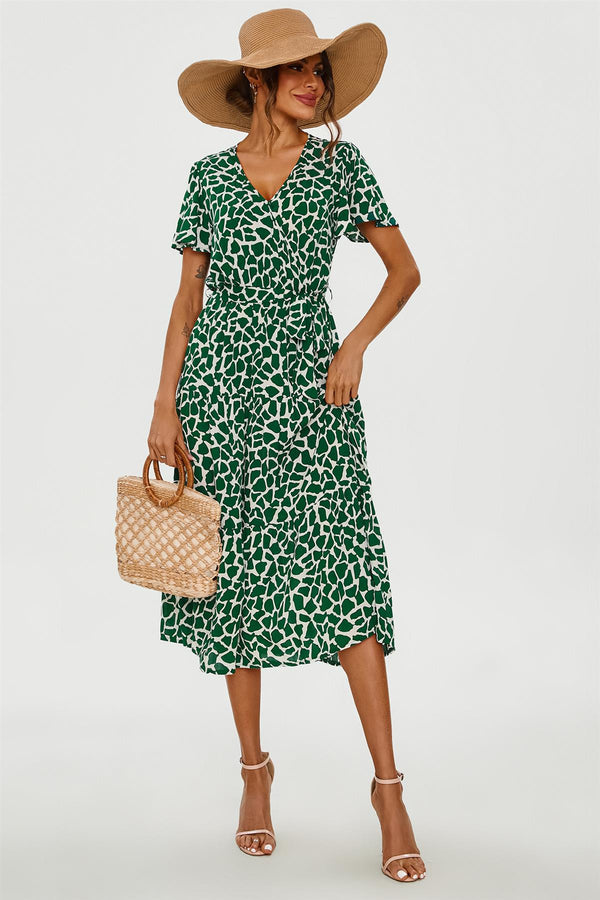 – Gestuftes Midi-Wickelkleid mit Geo-Print am Saum in Grün