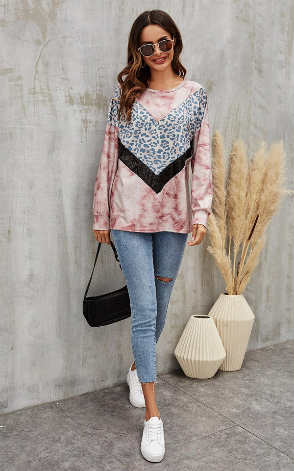 Schwarzes, gestreiftes Oberteil mit Animalprint und Pailletten in Batik-Pink